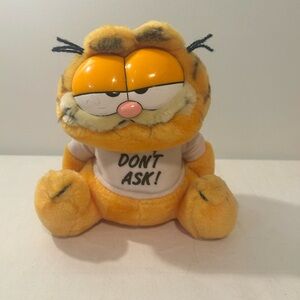 Vintage 1981 Garfield Plush Toy with 'Don't Ask!' Shirt
With original tags